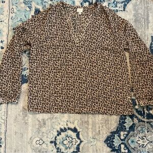 a new day semi-sheer leopard print blouse. Size XL